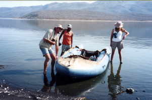 Sampling gear is stowed in the boat after launching