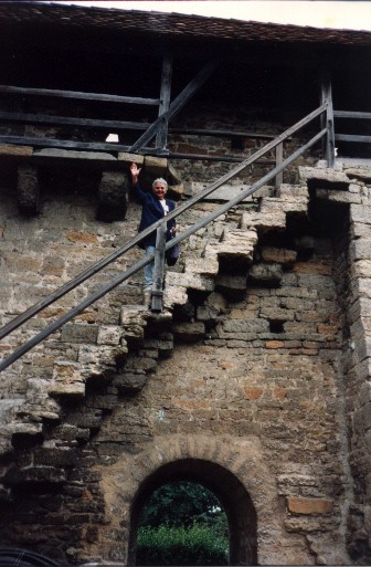 Ancient rock walls that once surrounded the city are now enclosed within the modern city